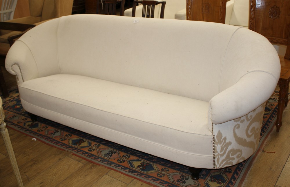 An Italian settee, upholstered in white velvet type material with gold foliate scroll fabric to the sides and back, W.220cm D.80cm H.80